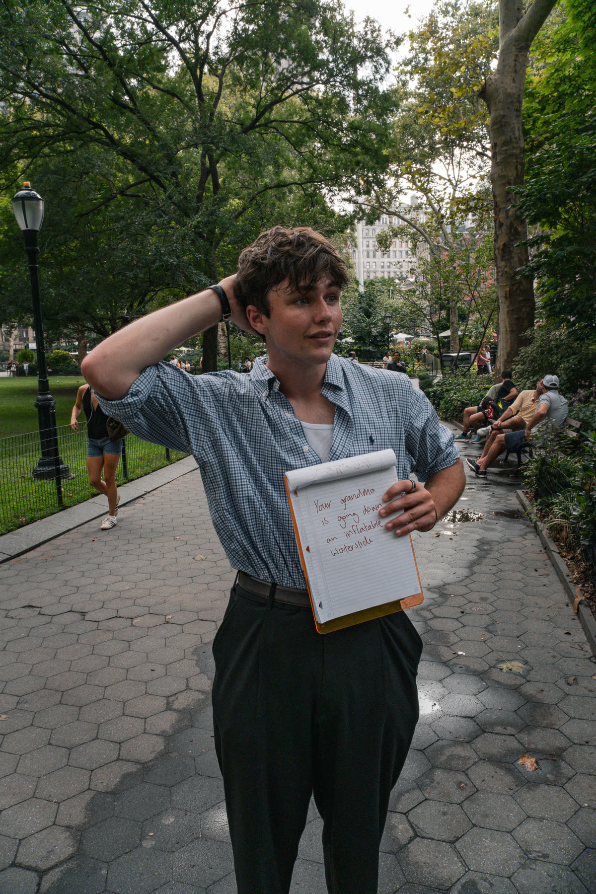 Fourth participant gesturing in surprise while holding his inherited instruction